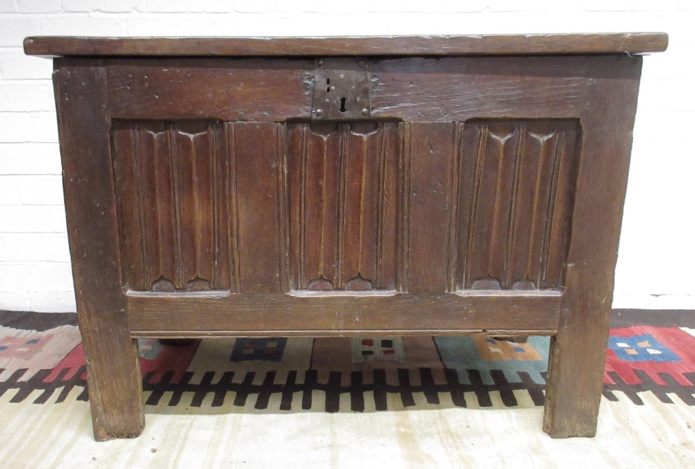 18th century oak coffer, hinged three panel lid and three linenfold panel front, W104cm D51cm