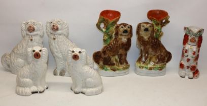 Two pairs of white Staffordshire style pottery mantle dogs, a similar jug in the form of a begging