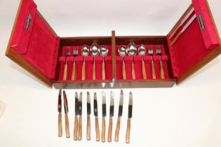 Fitted canteen of Sanenwood wooden handled stainless steel cutlery for six covers, c1960s