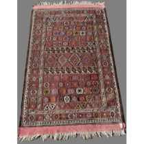 20th century Persian wool rug, geometric multi-coloured field within repeating border, W115cm W186c