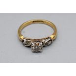18ct yellow and white gold solitaire ring single diamond set in square illusion mount on ornate
