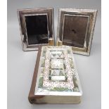 Holy Bible with applied front made from carved mother of pearl and paua shell with order of the Holy