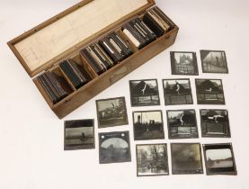 Collection of various photographic magic lantern slides incl. Zoo animals, gymnasts, dock scenes, f