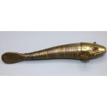 Early 20th century articulated brass Indian Medina style fish, red paste eyes, L23.5cm