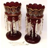 Pair of Victorian ruby glass table lustres with floral painted decoration, H36cm