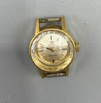 Ladies Omega Ladymatic gold plated automatic wristwatch, signed brushed silvered dial, baton hour