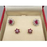 Two pairs of 9ct yellow gold ruby and diamond stud earrings, stamped 375, 2.8g
