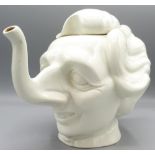Luck & Flaw white glazed teapot and cover in the form of Margaret Thatcher, H20cm