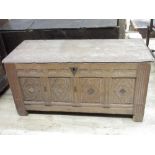 18th century oak coffer, later planked top above four geometric with stop fluted supports, lozenge