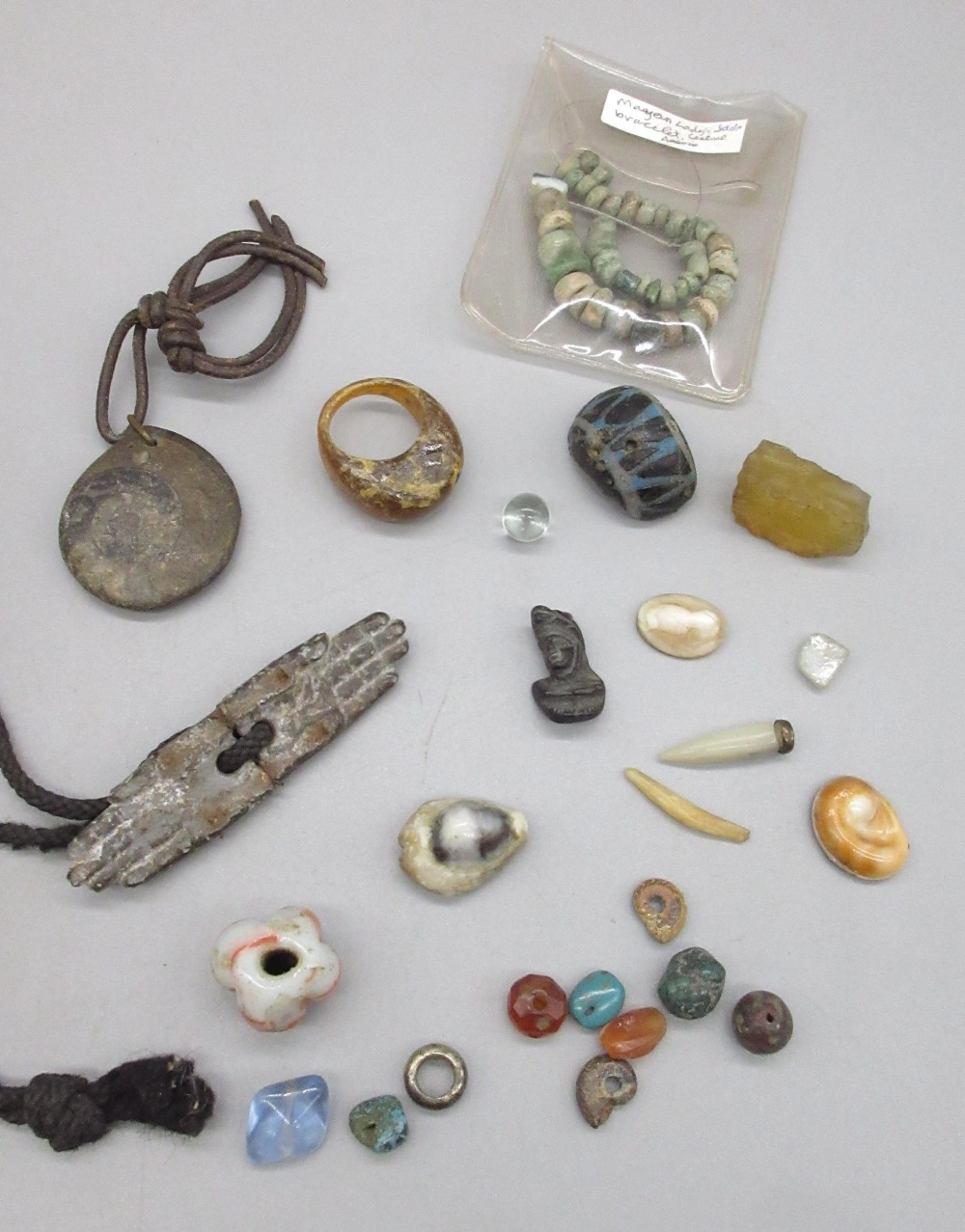 Bust pendant engraved SK, a cameo, a jade bracelet, and a collection of ancient beads and carved - Image 2 of 3