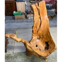 Large yew tree trunk chair with natural features and drinks arm. Height approx 170cm