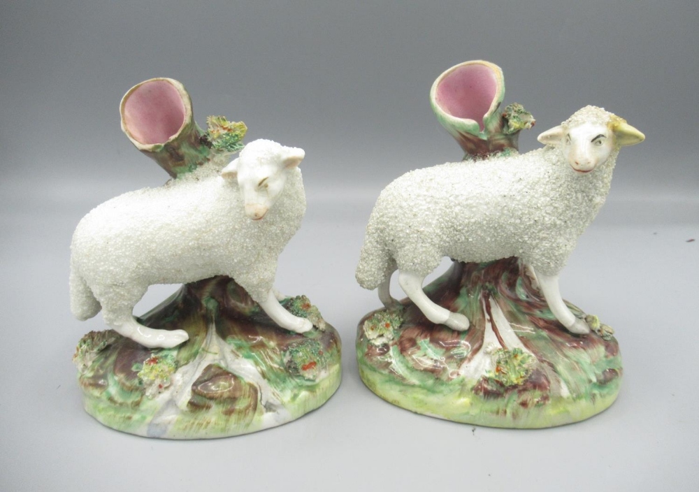 Pair of Staffordshire sheep spill vases, H12.5cm, A/F