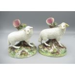 Pair of Staffordshire sheep spill vases, H12.5cm, A/F