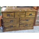 Laura Ashley side cabinet with an arrangement of eight drawers, on a skirted base, w127cm D44cm