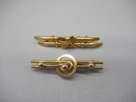 9ct yellow gold bar brooch set with clover with ruby to centre, and another 9ct bar brooch with