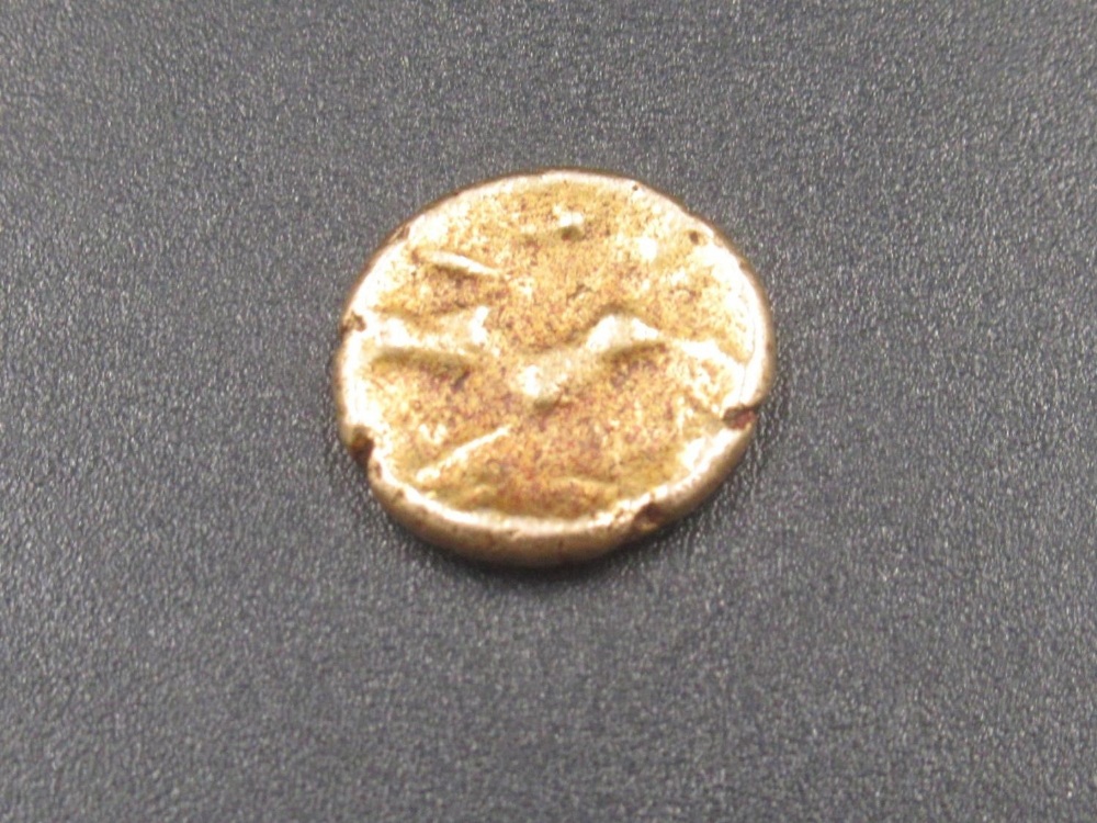 Celtic/Belgic Migration quarter gold stater, heavy wear to coin, (0.7g) (Victor Brox collection)