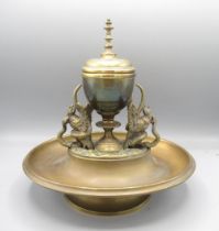 Brass inkwell in the form of an urn flanked by snakes and birds, L25cm