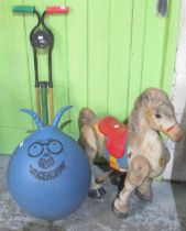 Collection of vintage toys, comprising a painted metal ride on horse, blue Spacehopper, and a pogo