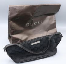 GUCCI mini shoulder bag, in black logo fabric, serial number 07193 002122, W28cm