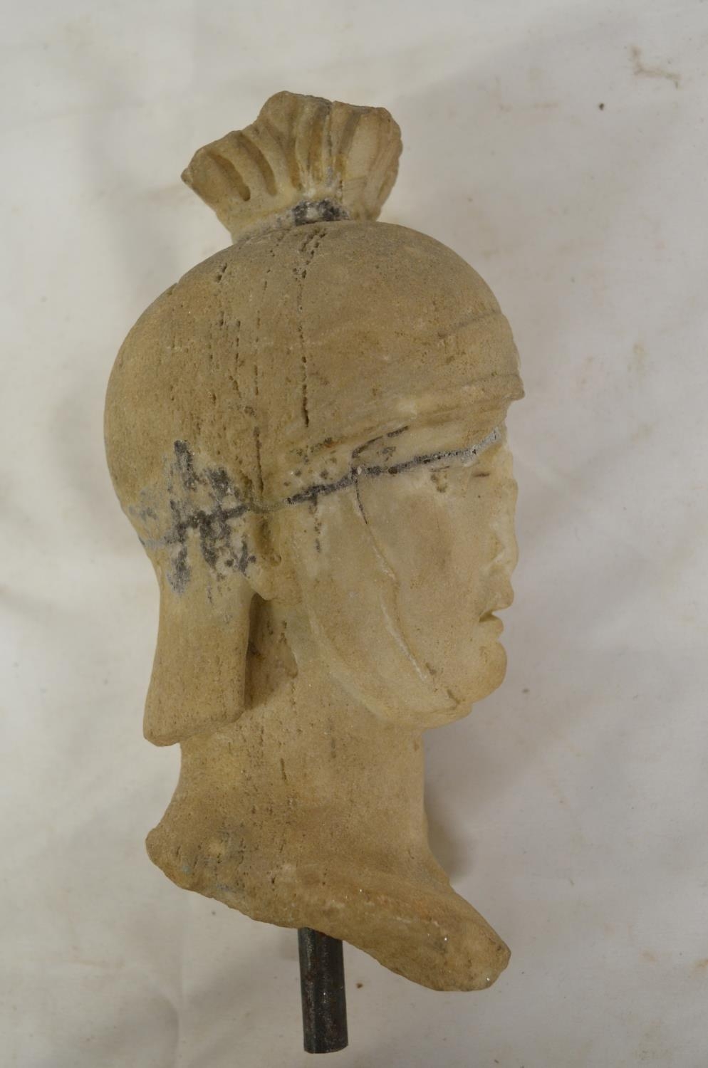 Carved marble head of a Roman soldier, damaged and pieced back together. With vertical stand rod, no - Image 3 of 4