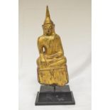 18/19th century wood carved Buddha on plinth with gilded finish with red seat, overall height