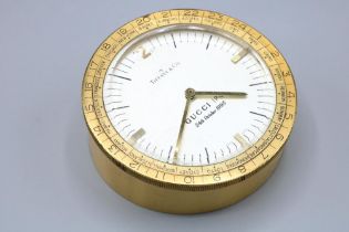 Tiffany & Co, a gilt brass World Time desk clock, with text to face 'Gucci IPO 24th October 1995',