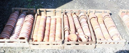 (Large quantity). Four crates of circa 1940s terracotta plant pots. Sizes 3 inch and 4 1/2 inch