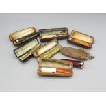 Collection of gold and yellow metal mounted cigar and cheroot holders, incl. 18ct gold and amber