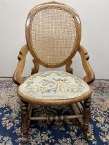 Victorian rocking chair, bergere back panel, circular seat with upholstered seat pad, H89cm