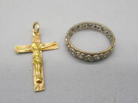Yellow metal crucifix with markings to reverse, 1.9g, a 9ct white gold band ring with heart