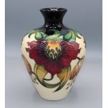 Moorcroft Pottery, Anna Lily pattern oviform vase, designed by Nicola Slaney, H18.5cm