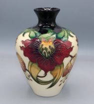 Moorcroft Pottery, Anna Lily pattern oviform vase, designed by Nicola Slaney, H18.5cm