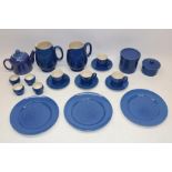 Collection of Moorcroft Powder Blue glaze tableware, comprising teapot, four coffee cans and
