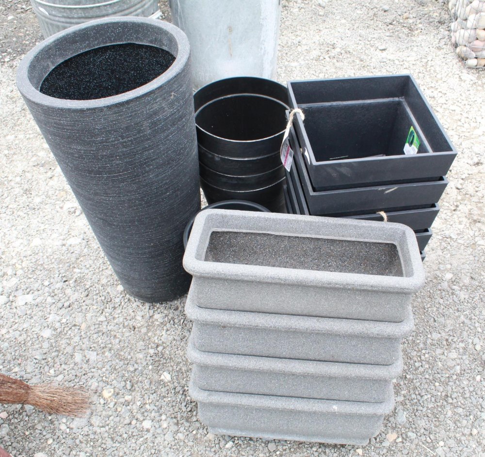 Collection of plastic planters of various styles