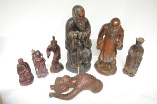 Collection of wood carved figures, most appear Chinese in origin. Largest figure H33cm (7). (