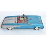 WITHDRAWN - Vintage West German lithographed pressed steel push along friction powered car model wi