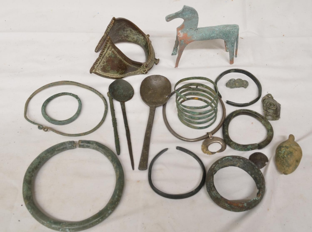 Collection of ancient bracelets and other decorative objects to include Celtic bronze neck and wrist