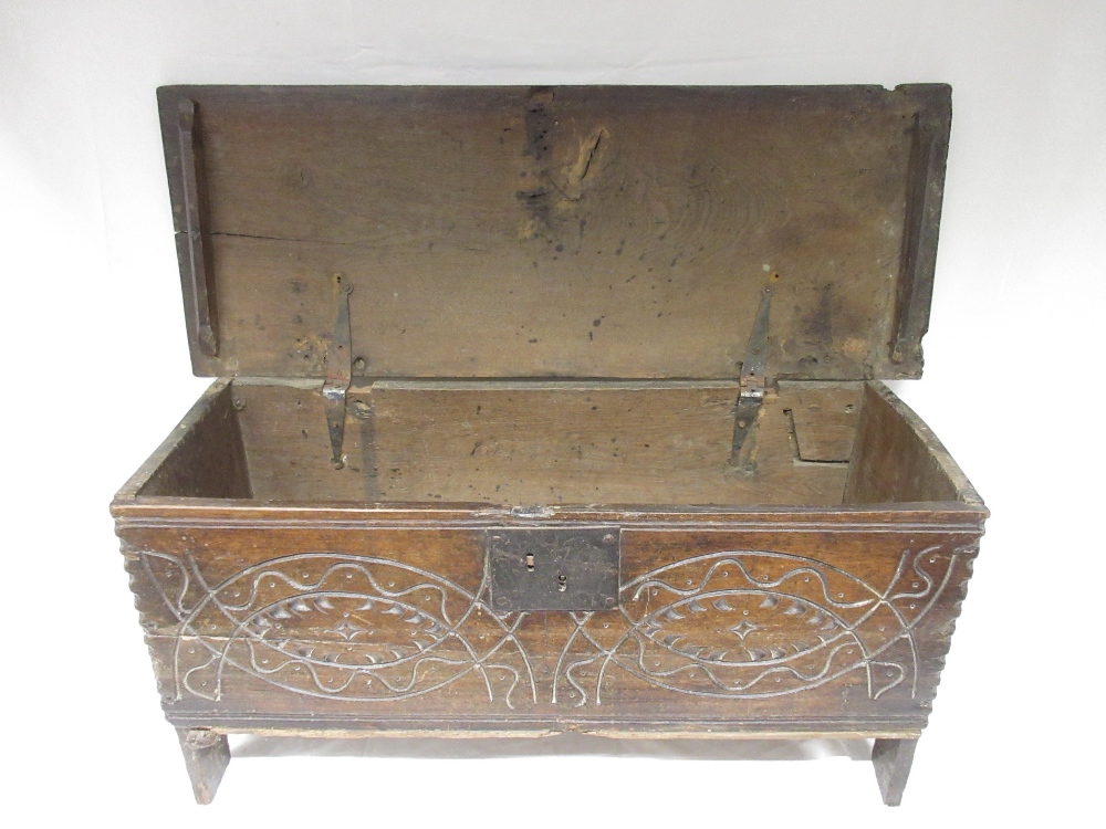 18th century oak boarded coffer, chip carved with scrolls, W96cm D36cm H46cm (Victor Brox - Image 2 of 3