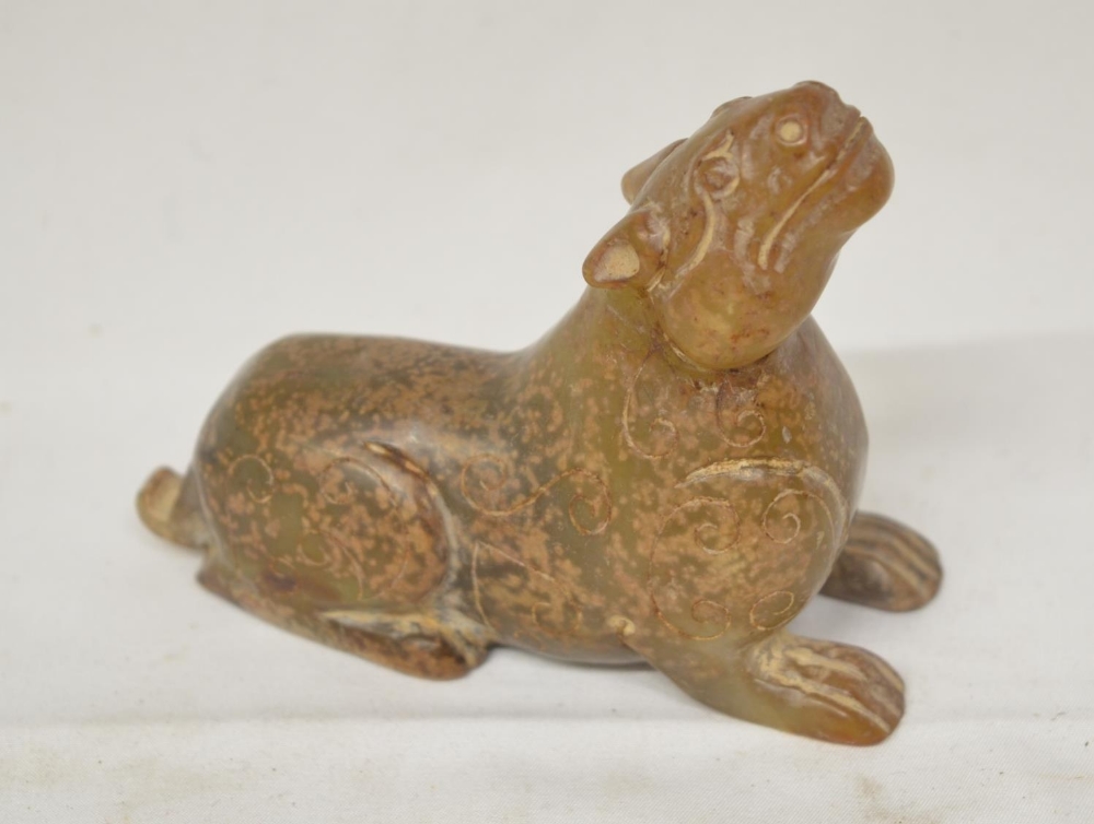 Carved jade figure of a feline like animal, W11.5xH8.5cm (Victor Brox collection)