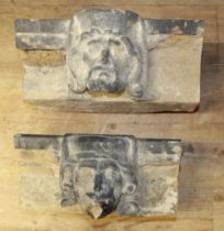 Pair of French ecclesiastical sculpted heads with accompanying church masonry (Victor Brox