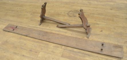 C17/18th Country made long bench, moulded seat on solid supports with stretcher, W244cm D26cm