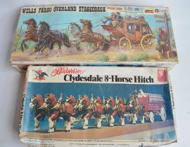 Two vintage unstarted horse and coach/cart plastic model kits to include Lindberg 1/16 Wells Fargo