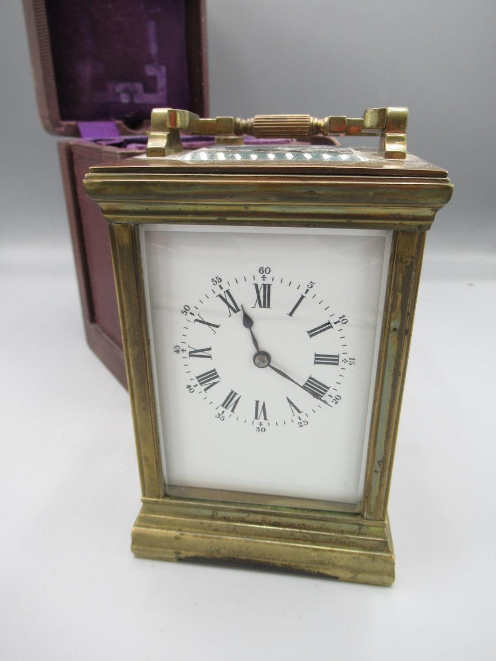 Early C20th 8 day French brass carriage clock timepiece, moulded case, beveled glass panels no.7263,