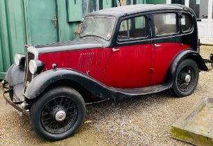 Classic 1935 Morris 8 saloon in red/black finish. 885cc petrol, historic classification, 4 door,