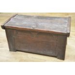 18th century oak clamp front coffer with hinged top and shaped frieze, W115cm D58cm H58cm (Victor