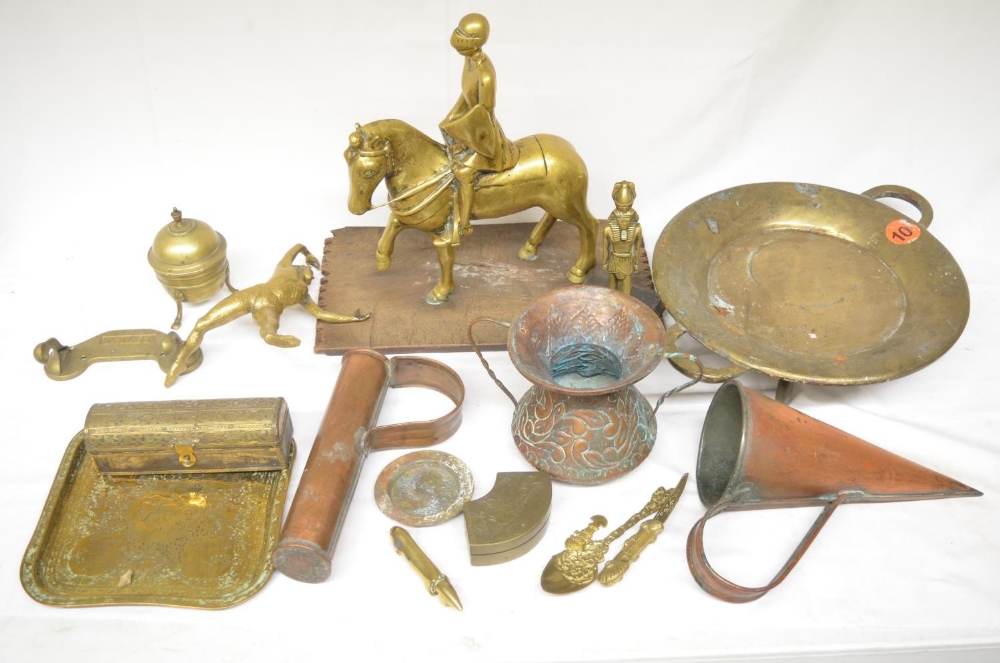 Collection of brass and copper ware to include copper measuring vessels, brass mounted knight,