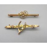 9ct yellow gold brooch set with single pearl and wishbone design, stamped 375, and a 15ct gold