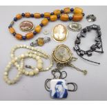 Cameo brooch set in 9ct yellow gold mount, an orange and blue bead necklace and other costume