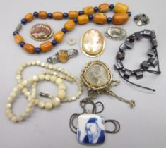 Cameo brooch set in 9ct yellow gold mount, an orange and blue bead necklace and other costume