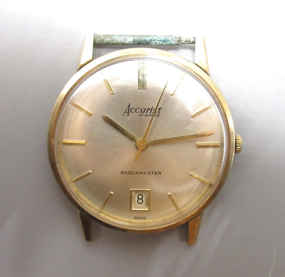 WITHDRAWN Accurist 9ct gold wristwatch with date, signed sunburst silvered dial, applied baton hour